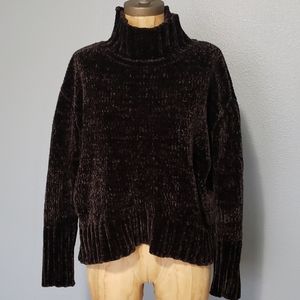 Chelsea and Theodore soft brown sweater